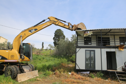 Arkeolojik sit alanında izinsiz yapıların yıkımı